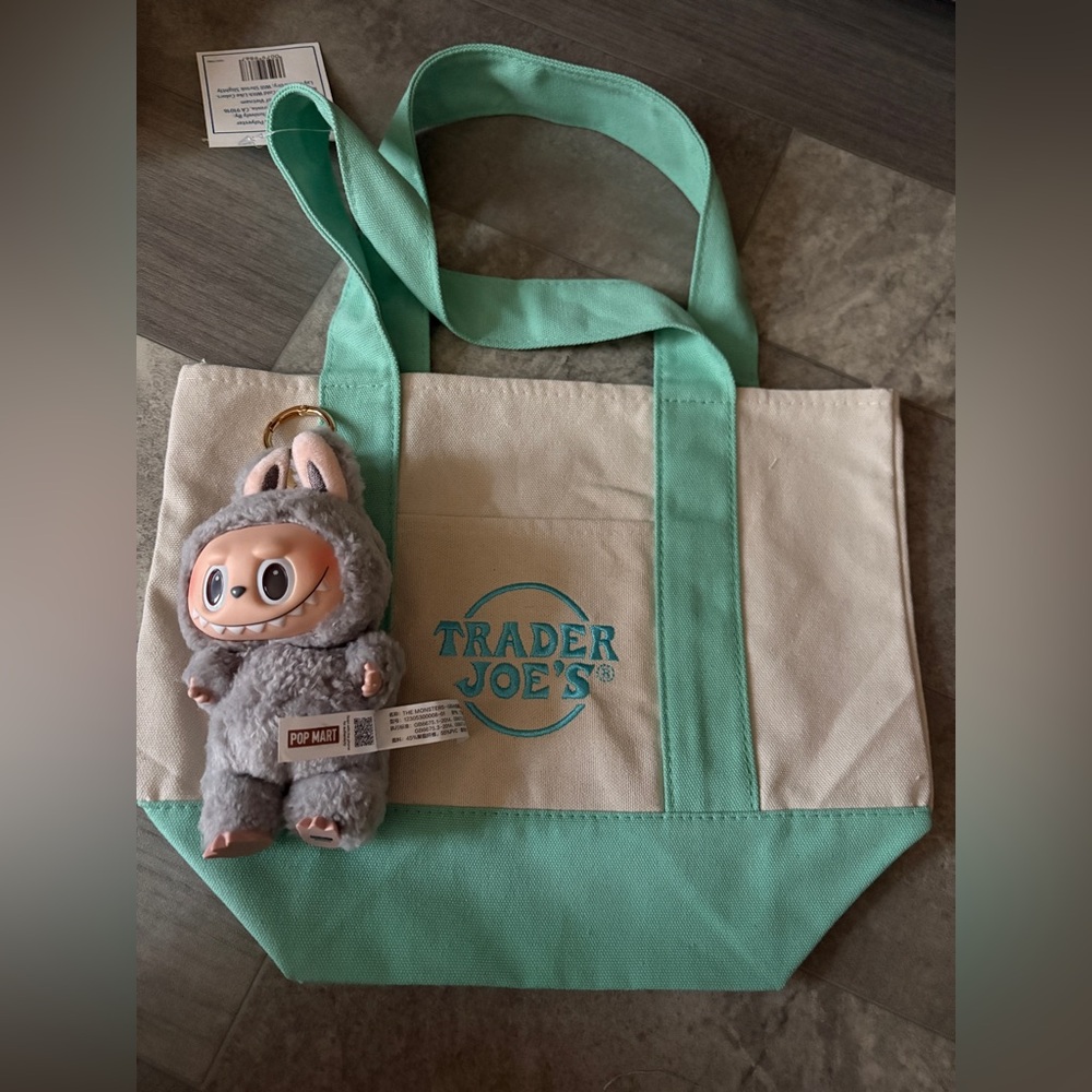 Trader Joe’s mini canvas tote bag in green and Labubu Macarons Sesame